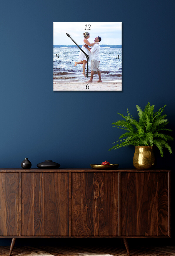 Couple enjoying on beach photo printed on wall clock